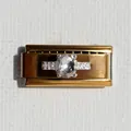 Macro di armonica dorata con intarsio anello argento e dettaglio gemma ovale - Zirconia Ovale Oro Tipo 2