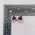 Polka dot layered hair bow in black and pink with ruler showing 4cm width detail - Pink Black Polka Dot Contrast (5)