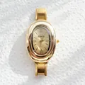 Vintage goldene ovale Quarzuhr mit disco Marken-Zifferblatt und Metall-Gliederkette - Römische Ziffern Oval Stil (disco) / Gold