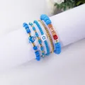 Detail of 5-piece bohemian beaded bracelet set in royal blue with gold accents - Dream Dark Blue
