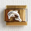 Detailed close-up of a gold Italian charm featuring a 3D silver dolphin relief carving - Dolphin
