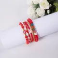 Detailed view of 5pcs red beaded bracelet set with HAPPY charms and floral accents - HAPPY - Red