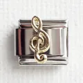 Detailed close-up of a 9mm silver stainless steel Italian charm with a golden treble clef - Note 2