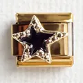 Macro detail of gold-plated star charm with black enamel for Italian modular bracelets - Star 1