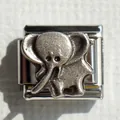 Macro shot of stainless steel Italian charm link featuring a pink glitter elephant charm - Elephant