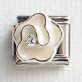Macro shot of stainless steel Italian charm with white enamel flower and crystal inlay - Silver Trim White Flower