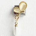 Macro detail of golden butterfly charm with cat eye stone and pearl for modular bracelet - Butterfly Waterdrop