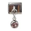 Close-up of silver Italian charm link with a round pink crystal birthstone pendant - February Purple Birthstone - Silver Base