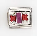 Macro shot of Italian charm link featuring a candy design in purple and red enamel - Purple Candy Pattern (0016-18)