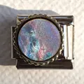 Macro shot of Italian charm link featuring holographic round inlay and gear-edge detail - Iridescent Holographic