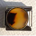 Detail of Italian modular bracelet link with stainless steel and amber resin inlay - Amber