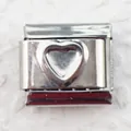 Macro shot of a 9mm stainless steel Italian charm link with a raised heart relief design - Embossed Heart (7)