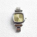 Detail of silver stainless steel pillow-shaped case and champagne dial with minimalist markers - Champagne Gold (Style 5)