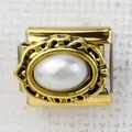 Macro shot of gold Italian charm link with oval white pearl and baroque filigree detail - White Pearl(21)