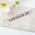 Dettaglio portachiavi a maglie modulari italiane in acciaio inox con decori floreali - Tema Arcobaleno Tropical