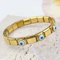 Bracelet italien doré à breloques avec maillons mauvais œil sur socle en pierre - Œil Blanc Or