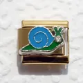 Detail of gold Italian charm link with colorful snail design and crystal accent - Snail