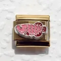 Close-up of a gold-plated stainless steel fish charm for modular Italian bracelets - Pink Fish