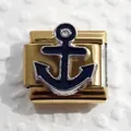 Detailed macro view of a gold-plated stainless steel Italian charm with a blue anchor and crystal - Anchor