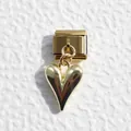 Macro shot of 3D gold heart charm with polished mirror finish for Italian charm bracelets - 3D Heart Shape