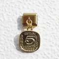 Macro view of a gold Italian link charm featuring a 1986 Ceylon 5 cents coin design - Vintage Ceylon Coin Style