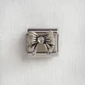 Détail du charm italien en acier inoxydable avec nœud vintage et strass étincelant - Nœud 1