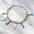 Gouden ketting met blauwe koraalhangers en witte visbedels voor de zomerstijl - Koraal Vis Armband