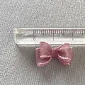 Pink mesh ribbon bow detail for DIY crafts with a ruler showing 2.5cm size dimension - Pink Mesh