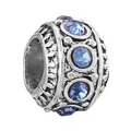Macro shot of silver charm bead with antique engravings and blue crystal stones - Vintage Carved Dark Blue Style (8)