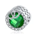 Silver alloy bead charm featuring a green faceted gem and hollow heart design - Green Gemstone Double Heart (25)