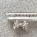 Close-up of a 2.5cm silver-gray mesh bow accessory showing fine metallic weave texture - Silver Gray Mesh