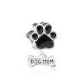 Zilveren Dog Mom bedel met zwarte emaille poot en bot hanger op een witte achtergrond - DOG MOM Poot en Bot