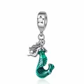 Detailed view of silver mermaid charm with green enamel scales and a single white pearl - Green Mermaid Style