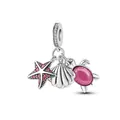 Silver ocean charm pendant featuring a pink starfish, seashell, and sea turtle dangles - Pink Ocean Trio