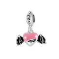 Macro view of gothic heart charm with bat wings in pink and black enamel finish - Bat Wing Heart