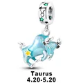 Silver alloy Taurus zodiac charm with light blue enamel bull and green star gem - Taurus