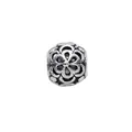 Macro view of retro silver floral charm bead with intricate hollow flower patterns - Six Petal Flower Embellished Bead