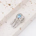 Detailed close-up of a dreamcatcher charm with blue heart stone and three feathers - Silver Dreamcatcher Blue Heart