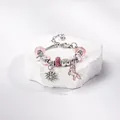 Bracciale natalizio rosa e argento con ciondoli a fiocco di neve e unicorno su pietra - Unicorno Rosa Fiocco
