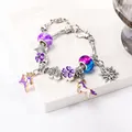 Dettaglio del braccialetto di Natale con ciondoli a forma di unicorno viola - Unicorno Viola Renna