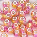 Detailed macro view of pink and orange gradient resin beads with silver metal cores - Pink Orange Gradient (10)