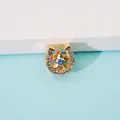 Golden horseshoe star pendant with sparkling rhinestones and blue center gemstone - Gold