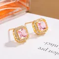 Elegant gold square pink zircon stud earrings with a halo of small white crystals - Pink