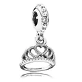 Silver crown charm pendant with hollow hearts and sparkling zircon stones on white background - Hollow Heart Crown