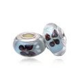 Blue glass charm bead with purple butterfly pattern and S925 sterling silver core - Light Blue Butterfly Design (Style 3)