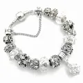 Pulsera de plata con abalorios de cristal violeta, copos de nieve y cadena de seguridad - 19cm / Blanco
