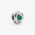 Detail of S925 silver woven charm featuring a round faceted green gemstone inlay - Green