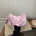 Sac à bandoulière floral rose avec nœuds, bords volantés et style féminin doux - Rose