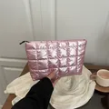 Compact pink quilted pouch with square stitching and zip closure for women's cosmetics - Pink
