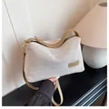 Schicke Leinen-Umhängetasche in Creme und Braun mit gewebter Textur und Lederdetails - Khaki